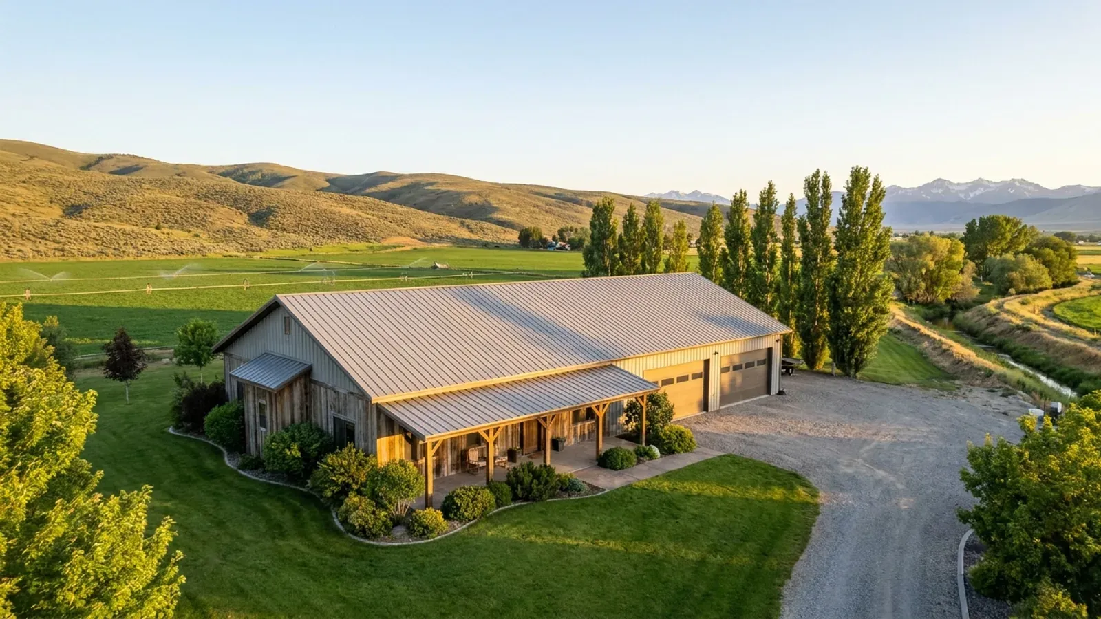 A completed single-story barndominium with a long, low roofline and no upper-level windows.